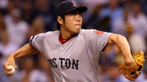 Woods delivering split-finger fastball, moving the red-socked team into the World Series