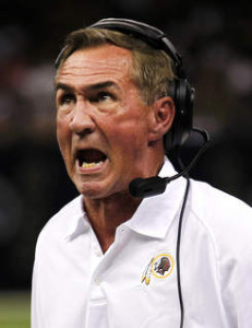 Aventinus coach Shanahanna-Montana urging players on the ice to "Back-check!"