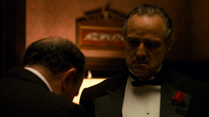 Making "an offer he won't refuse," GM Woodseone secured Calgary Flames game-worn socks for the team... or did he?