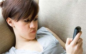 Brock making an ambiguous expression while answering text messages received from Sutton