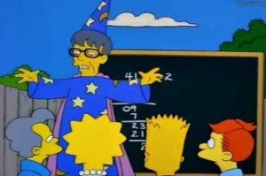 Winn delights audience at backyard children's party with "math-e-magic"